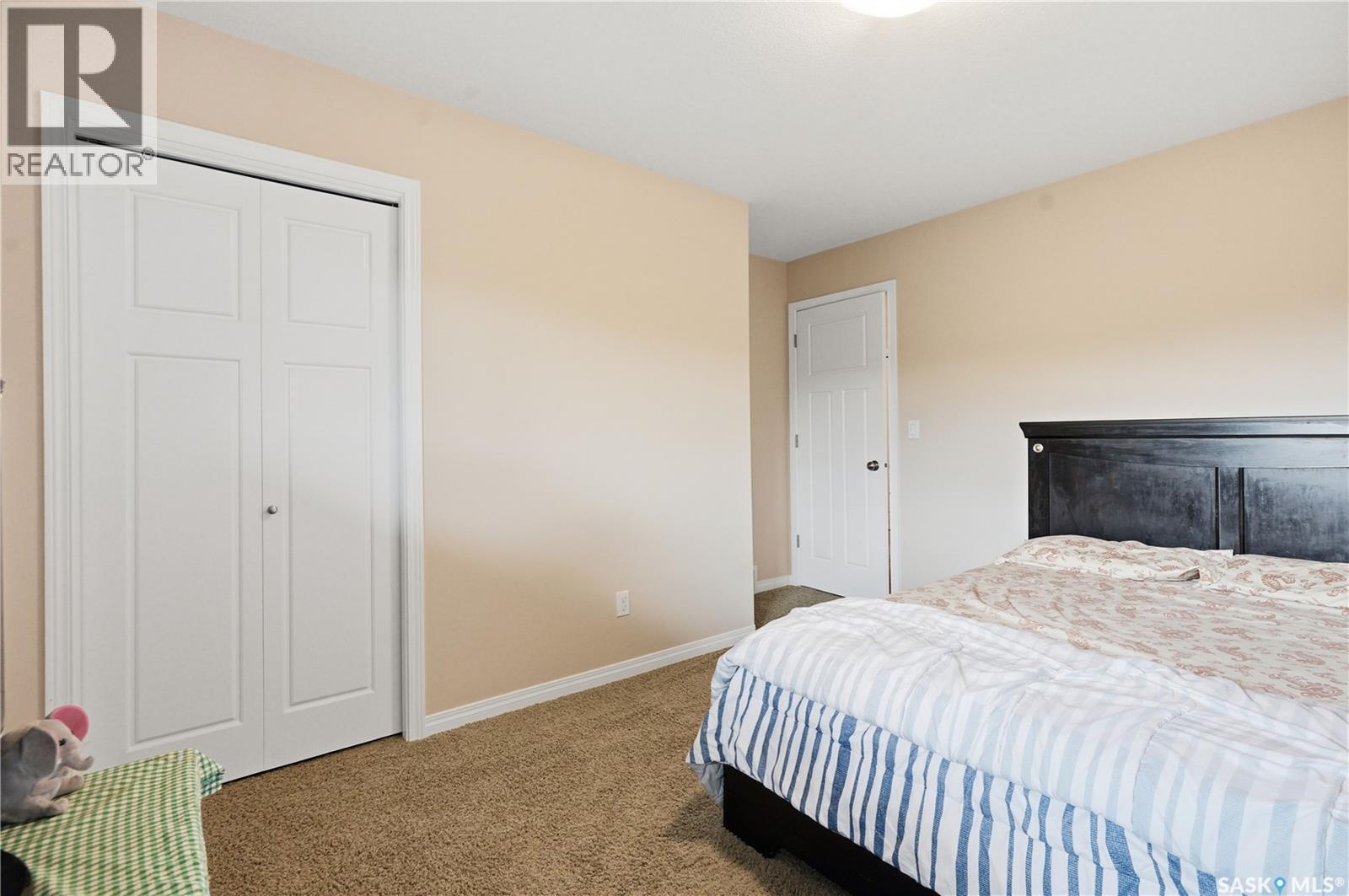14 502 Rempel Manor, Saskatoon, SK - Indoor Photo Showing Bedroom