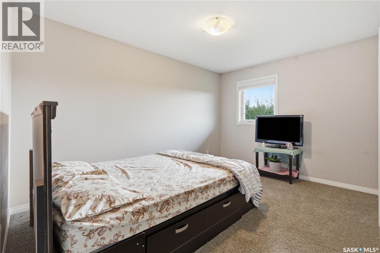 14 502 Rempel Manor, Saskatoon, SK - Indoor Photo Showing Bedroom