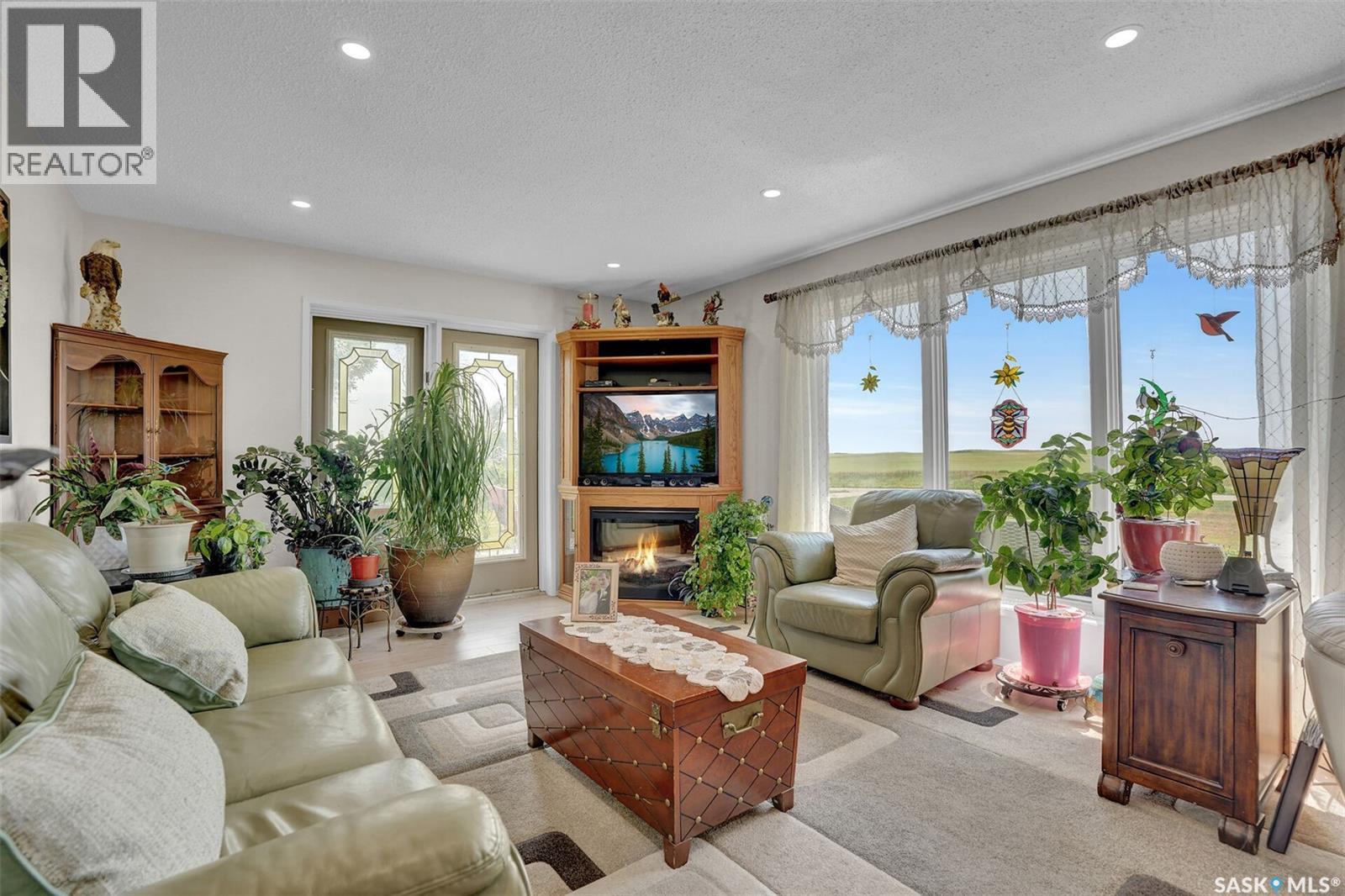 Dilke Acreage, Sarnia Rm No. 221, SK - Indoor Photo Showing Living Room With Fireplace