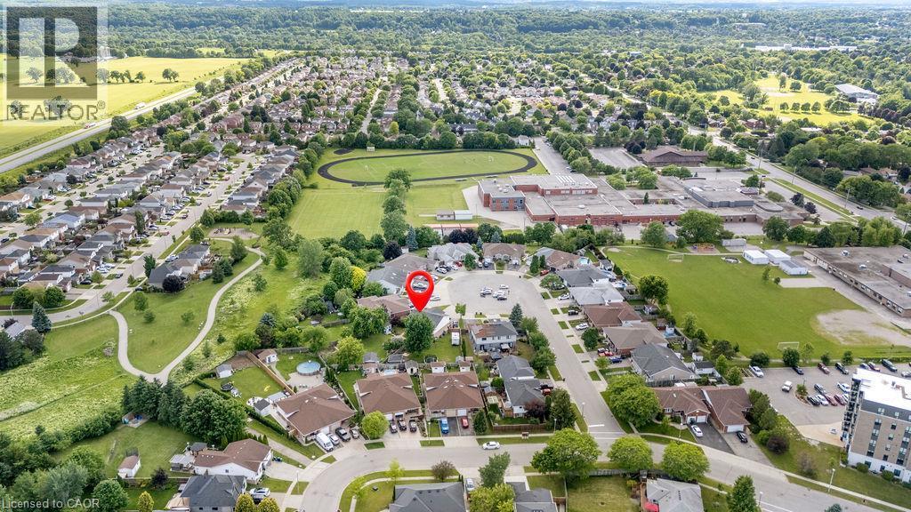 Aerial perspective showcasing a residential neighborhood with ample green space - 33 Remple Court, Cambridge, ON - Outdoor With View