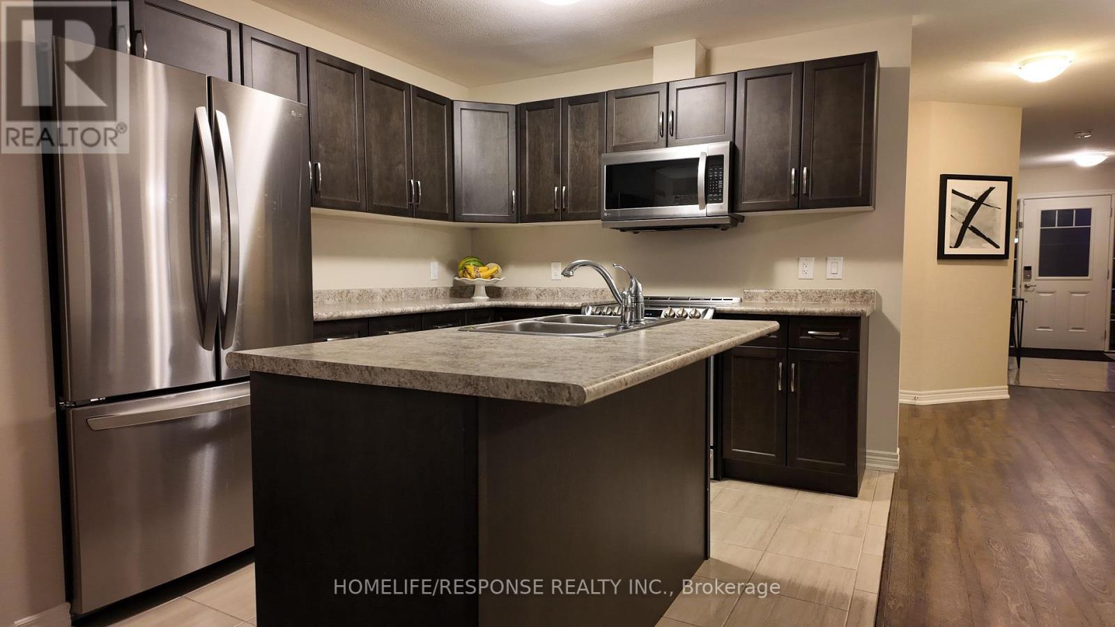 4451 Eclipse Way, Niagara Falls, ON - Indoor Photo Showing Kitchen With Stainless Steel Kitchen With Double Sink