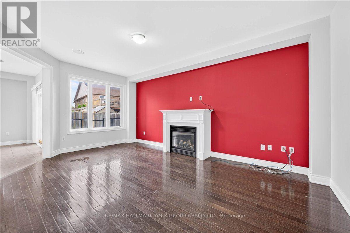 2094 Webster Blvd | Living room Gas Fireplace - 2094 Webster Boulevard, Innisfil, ON - Indoor Photo Showing Living Room With Fireplace