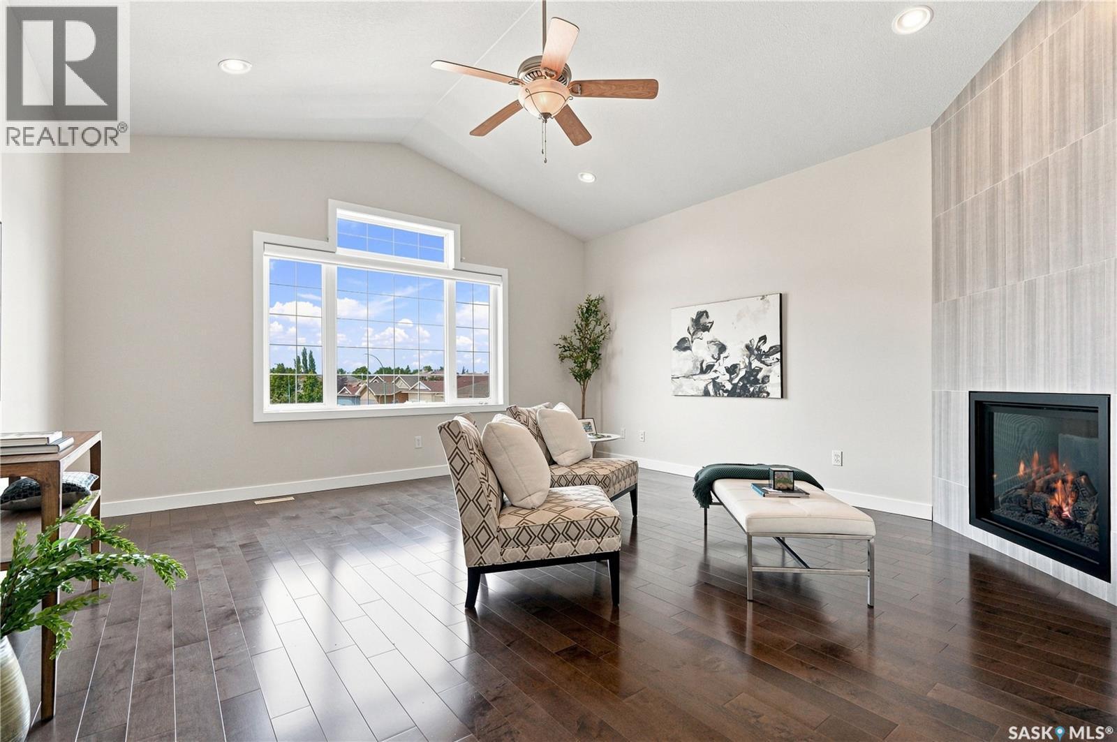 311 Lashyn Cove, Saskatoon, SK - Indoor Photo Showing Living Room With Fireplace