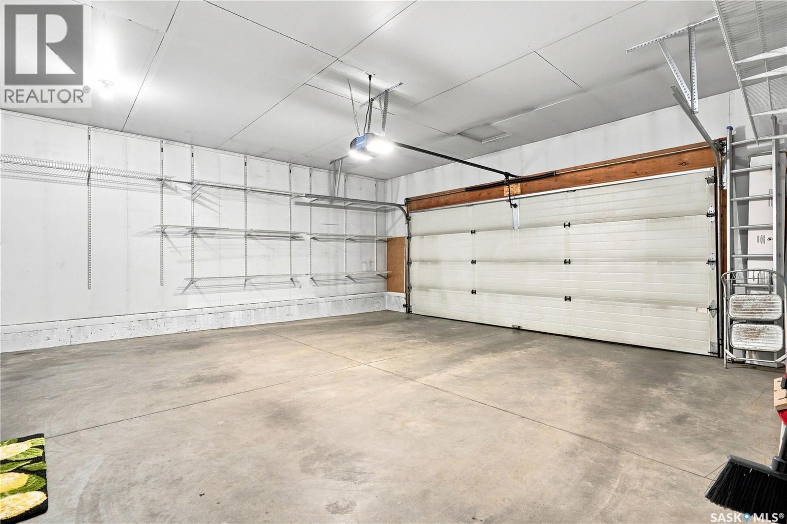 311 Lashyn Cove, Saskatoon, SK - Indoor Photo Showing Garage