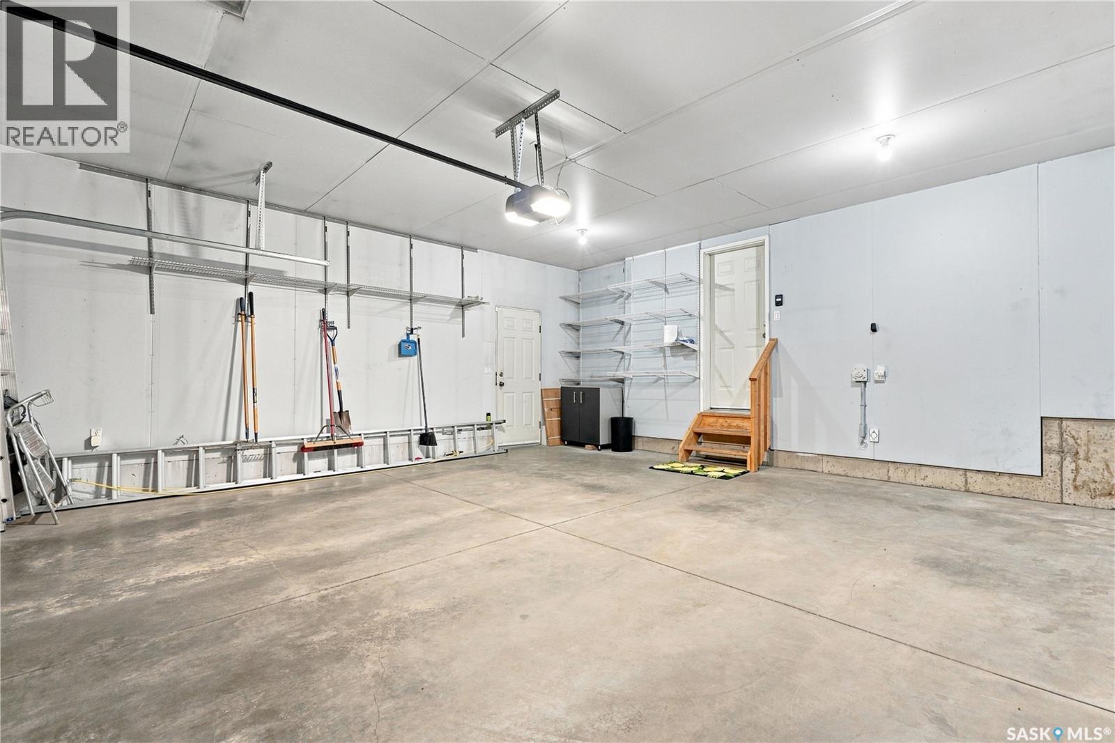 311 Lashyn Cove, Saskatoon, SK - Indoor Photo Showing Garage