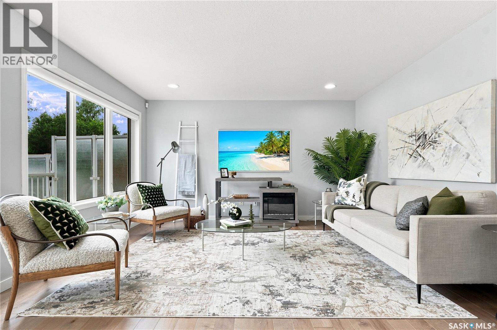 311 Lashyn Cove, Saskatoon, SK - Indoor Photo Showing Living Room