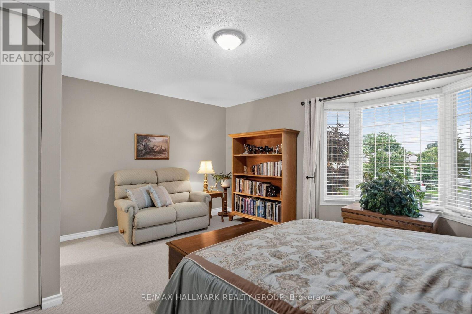 Sitting area in primary bedroom - 12 Ready Way, Ottawa, ON - Indoor Photo Showing Bedroom