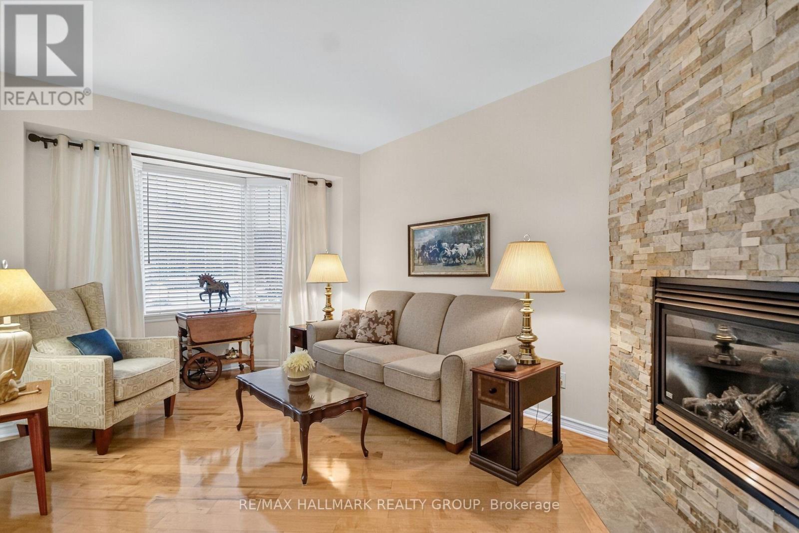 12 Ready Way, Ottawa, ON - Indoor Photo Showing Living Room With Fireplace