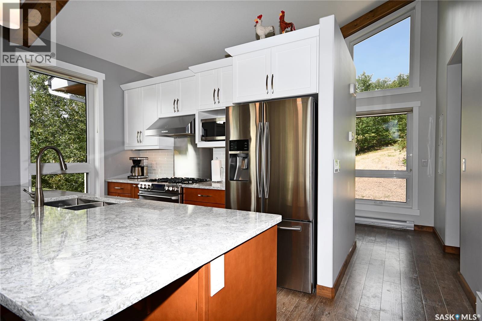 22 Tranquility Drive, Cowan Lake, SK - Indoor Photo Showing Kitchen With Double Sink