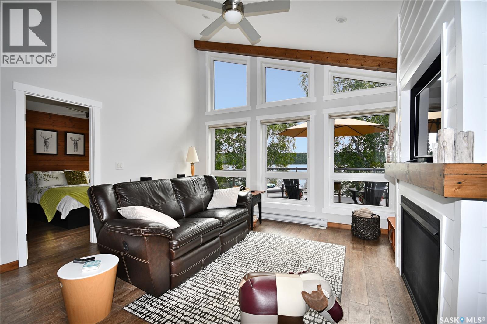 22 Tranquility Drive, Cowan Lake, SK - Indoor Photo Showing Living Room With Fireplace