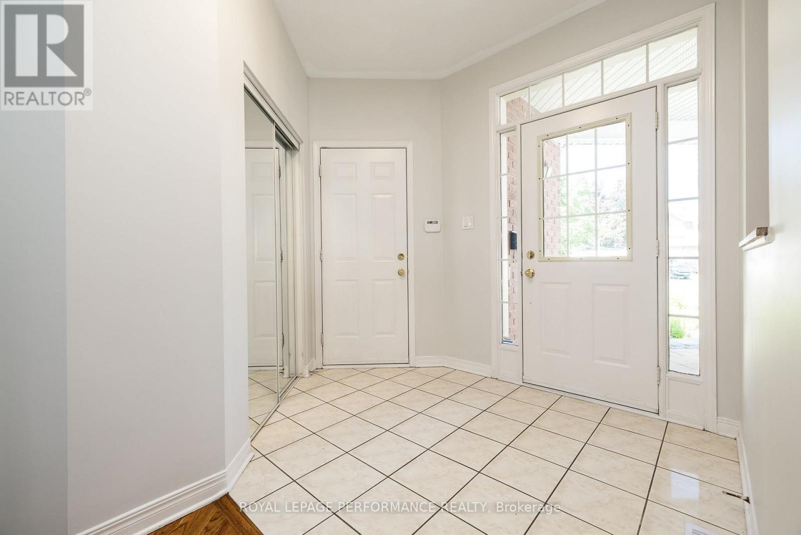Foyer with coat closet + inside entry - 127 Finn Court, Ottawa, ON - Indoor Photo Showing Other Room