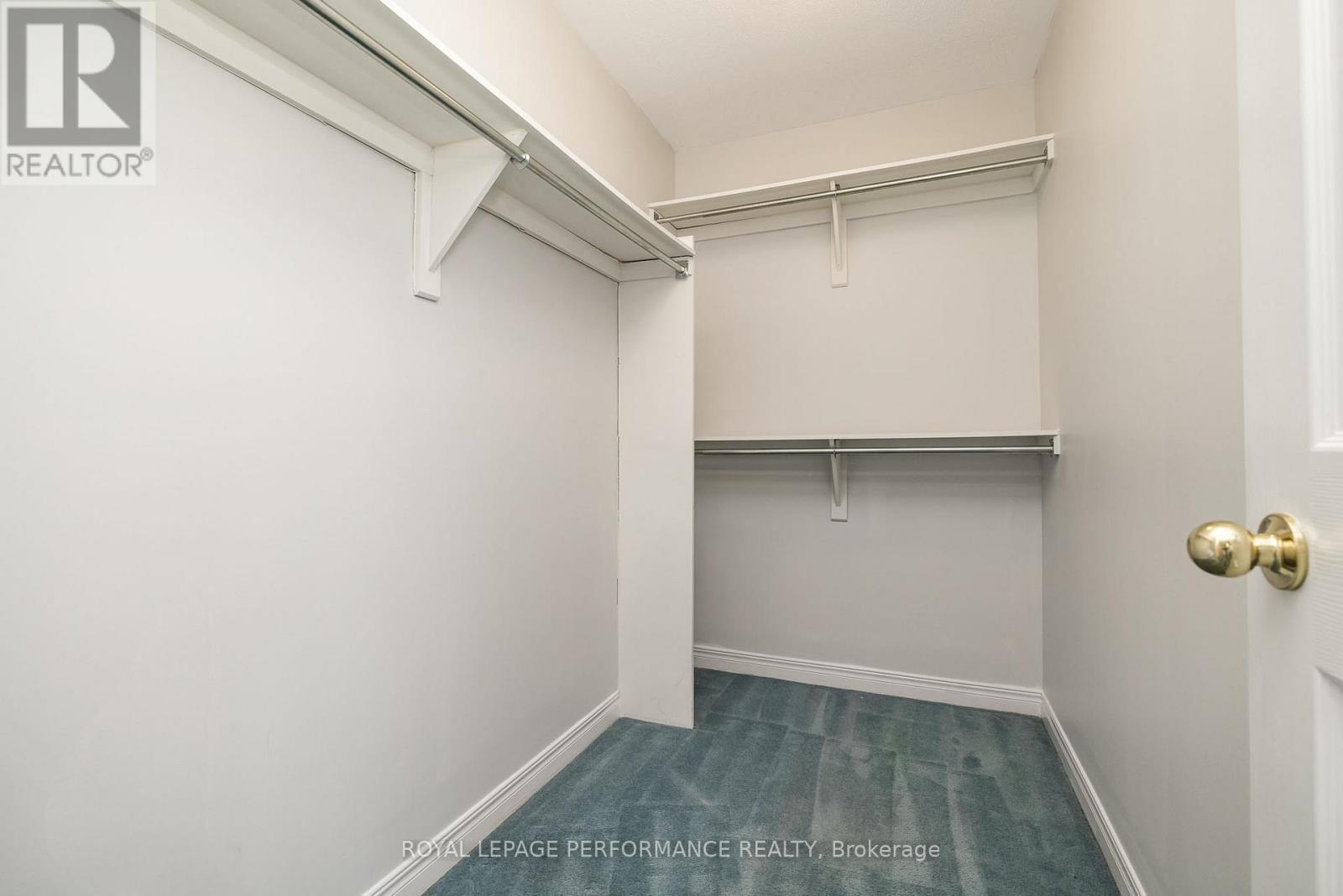 Walk-in closet in primary bedroom - 127 Finn Court, Ottawa, ON - Indoor With Storage