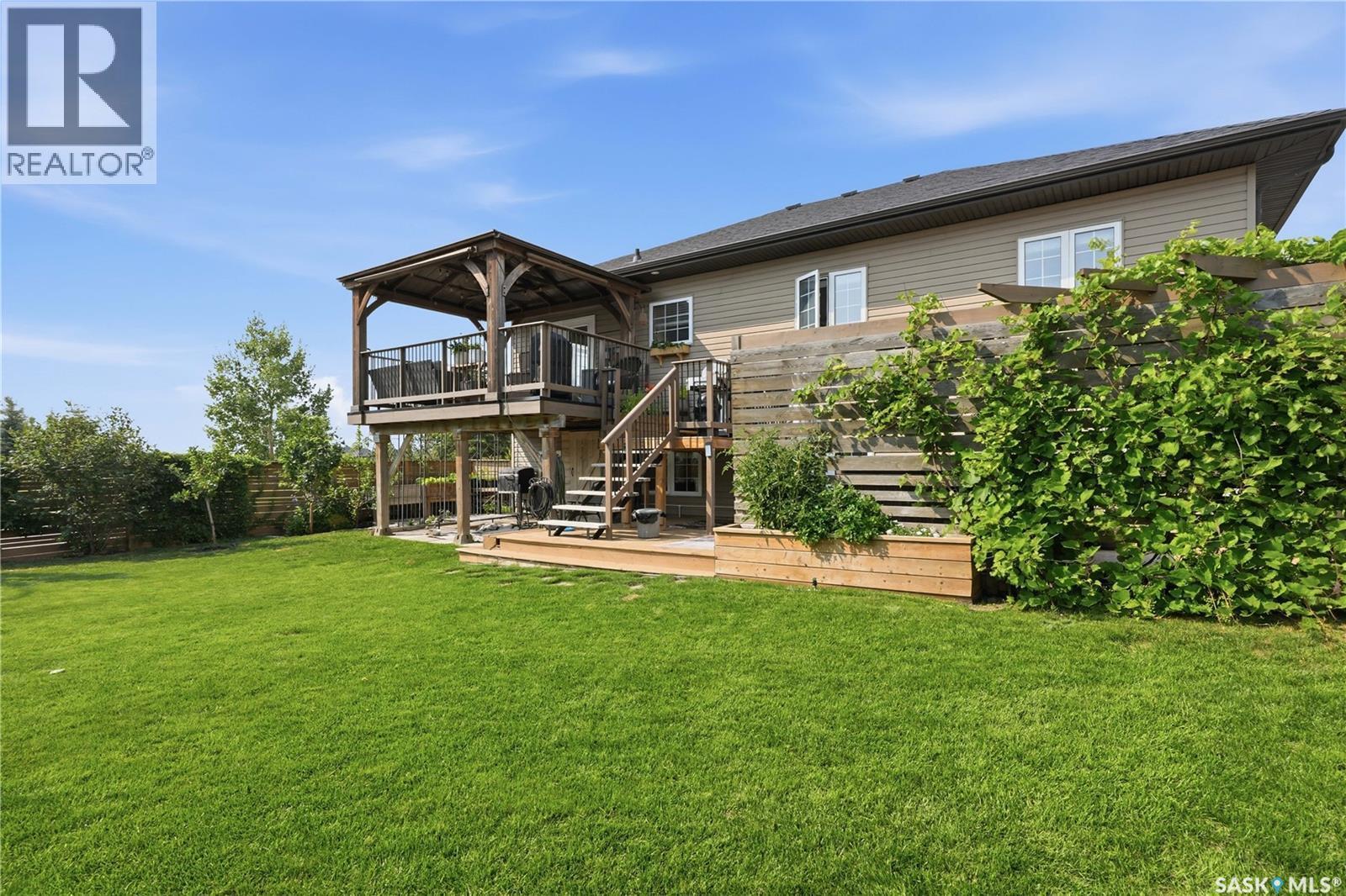 621 Braun Lane, Warman, SK - Outdoor With Deck Patio Veranda