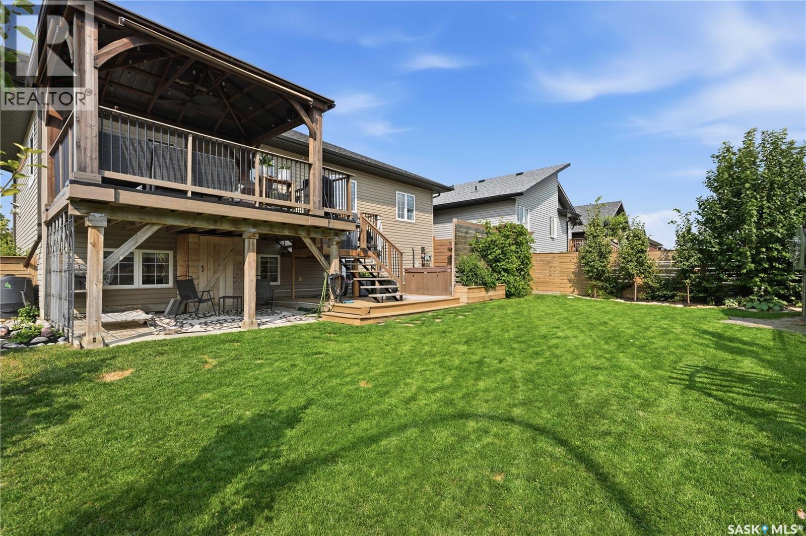 621 Braun Lane, Warman, SK - Outdoor With Deck Patio Veranda