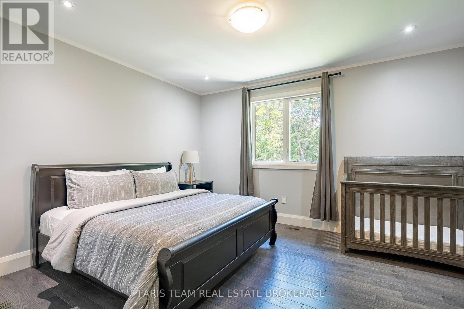 7 Duquette Court, Tiny, ON - Indoor Photo Showing Bedroom