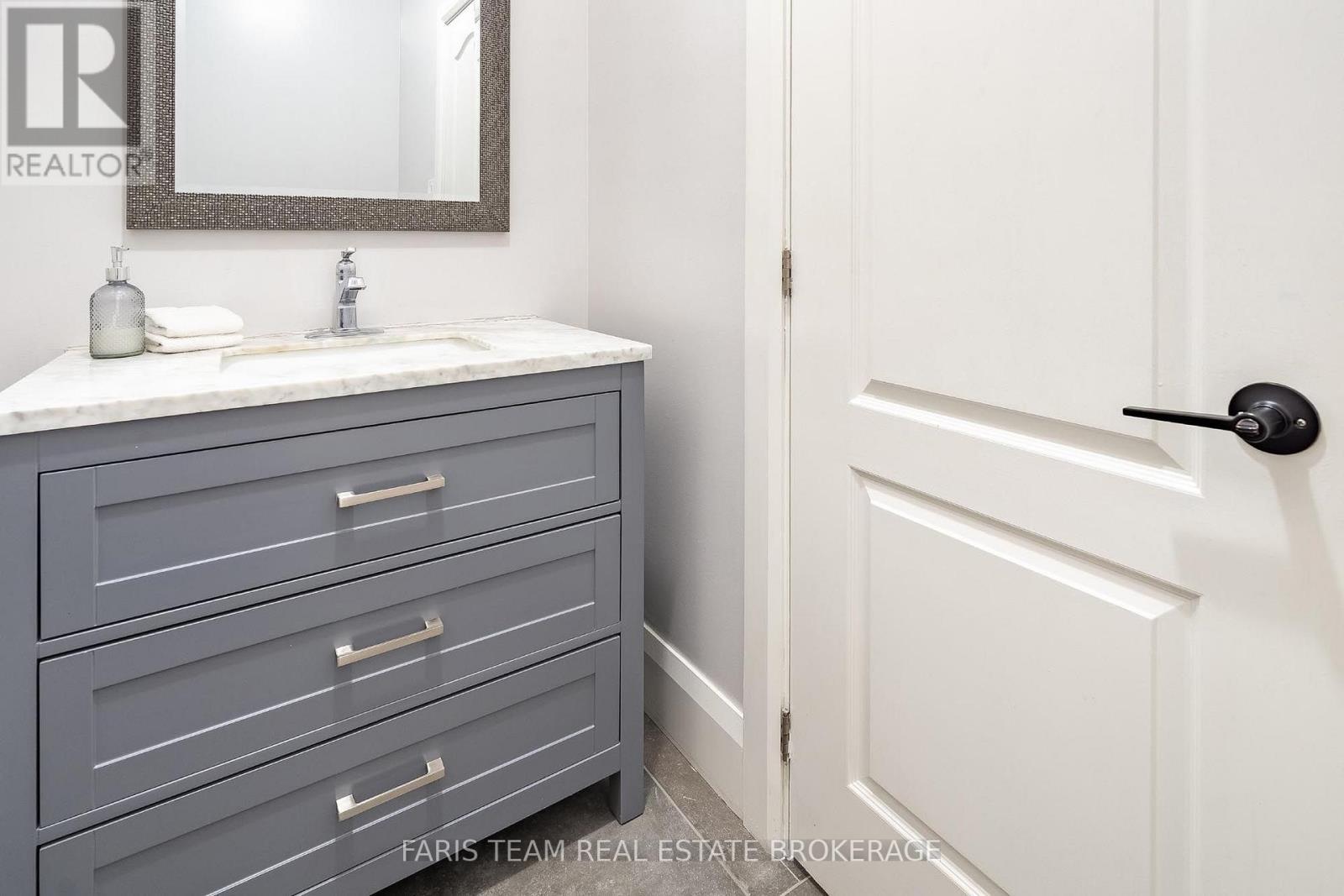 7 Duquette Court, Tiny, ON - Indoor Photo Showing Bathroom