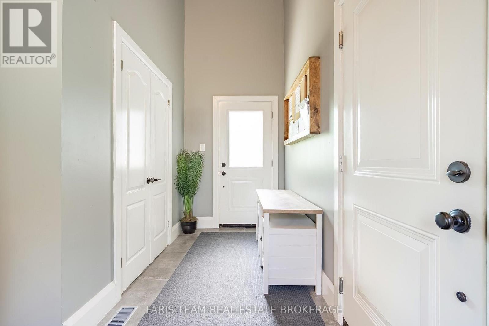 7 Duquette Court, Tiny, ON - Indoor Photo Showing Other Room