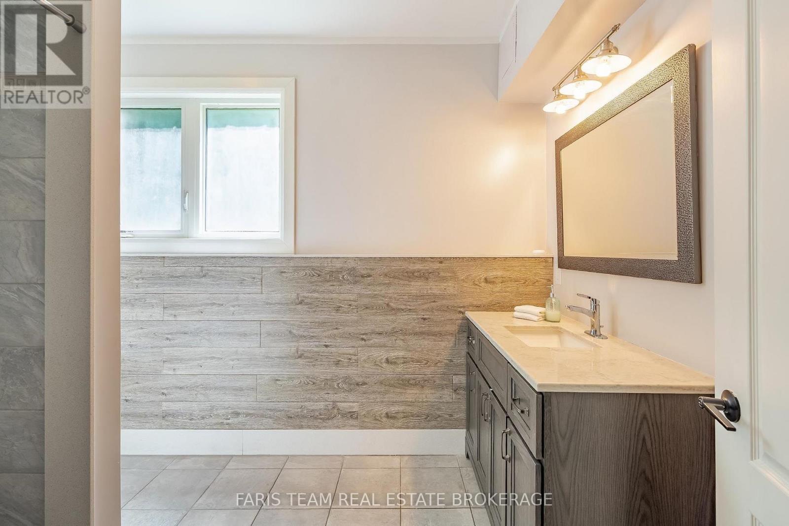7 Duquette Court, Tiny, ON - Indoor Photo Showing Bathroom