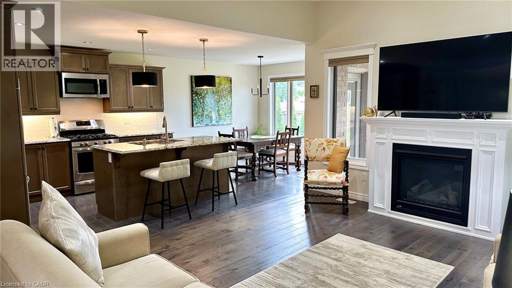 66 Driftwood Drive, Simcoe, ON - Indoor Photo Showing Living Room With Fireplace
