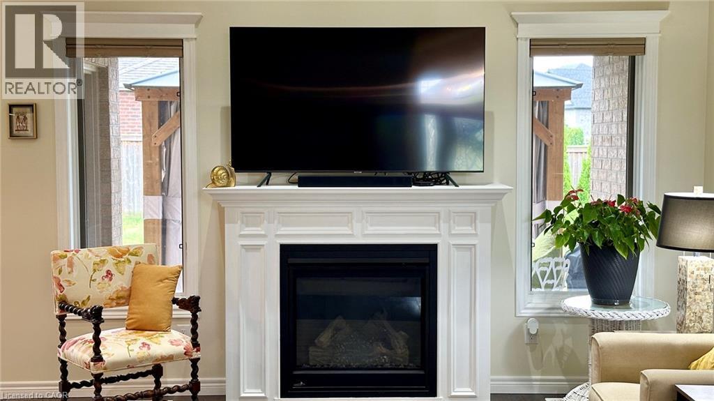 66 Driftwood Drive, Simcoe, ON - Indoor Photo Showing Living Room With Fireplace