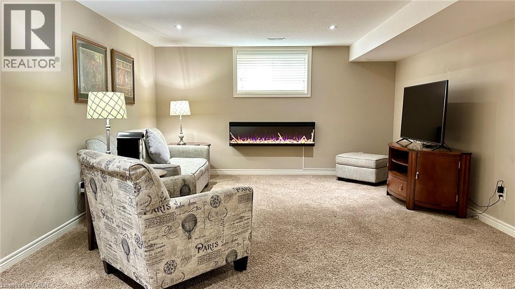 66 Driftwood Drive, Simcoe, ON - Indoor With Fireplace