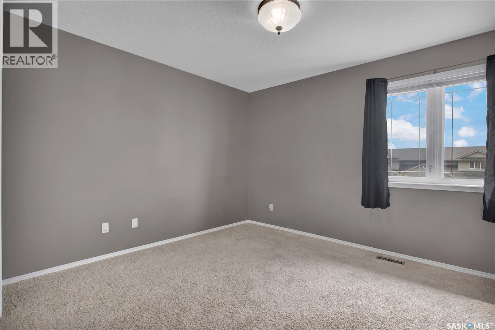 118 Meadowlark Park, Warman, SK - Indoor Photo Showing Other Room