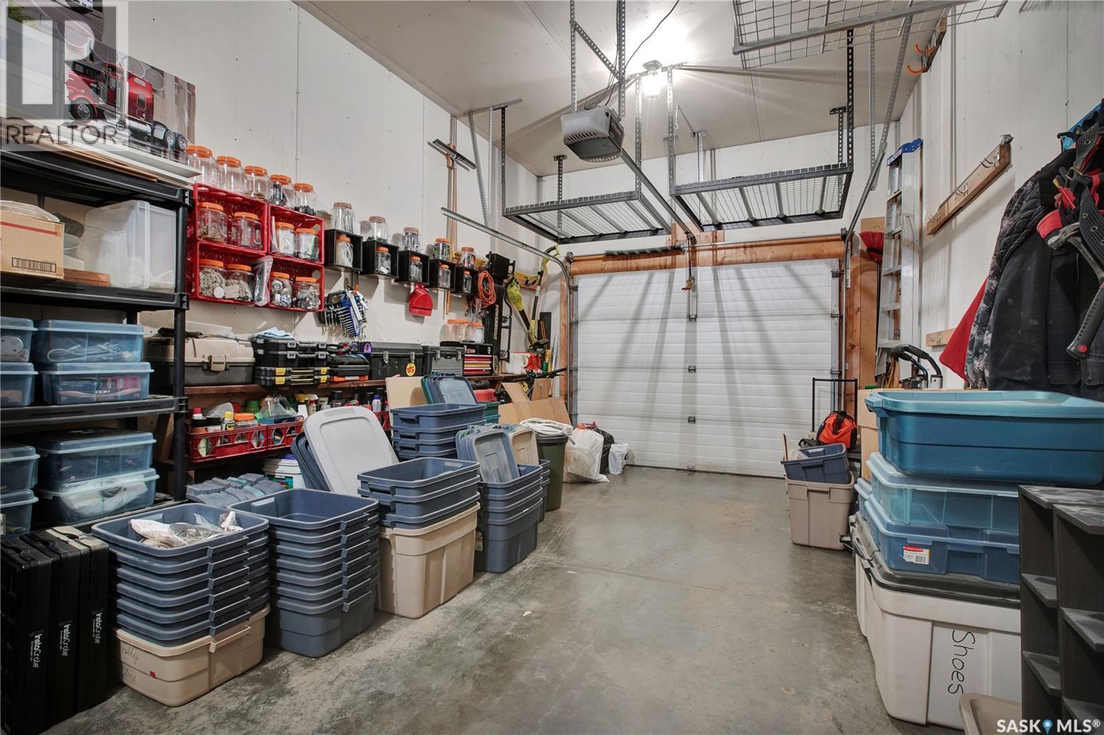118 Meadowlark Park, Warman, SK - Indoor Photo Showing Garage