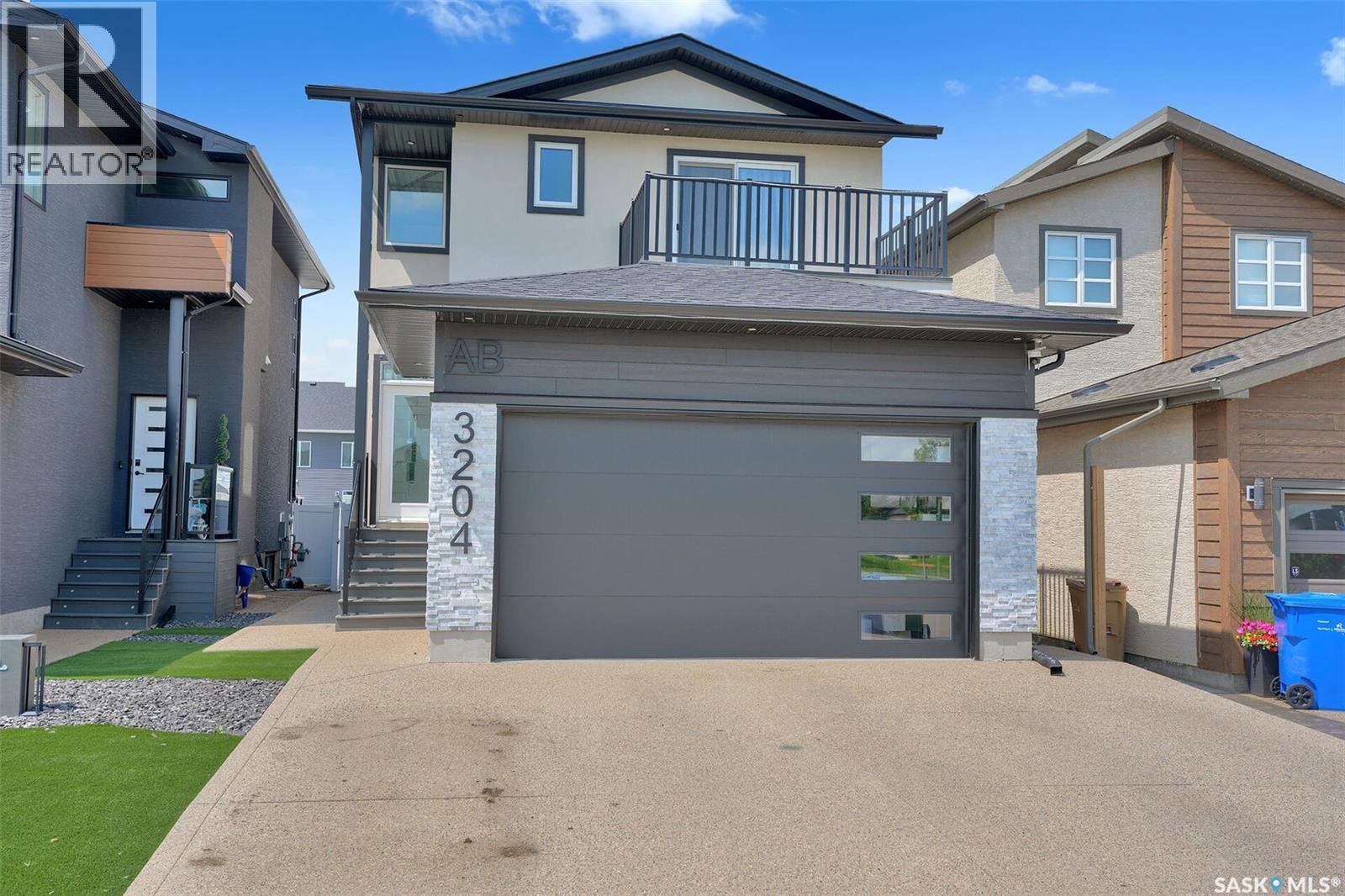 3204 Crosbie Crescent, Regina, SK - Outdoor With Balcony With Facade