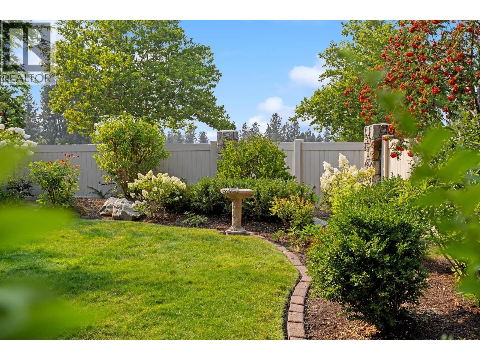 Landscaped backyard. - 4000 Gallaghers Terrace, Kelowna, BC - Outdoor