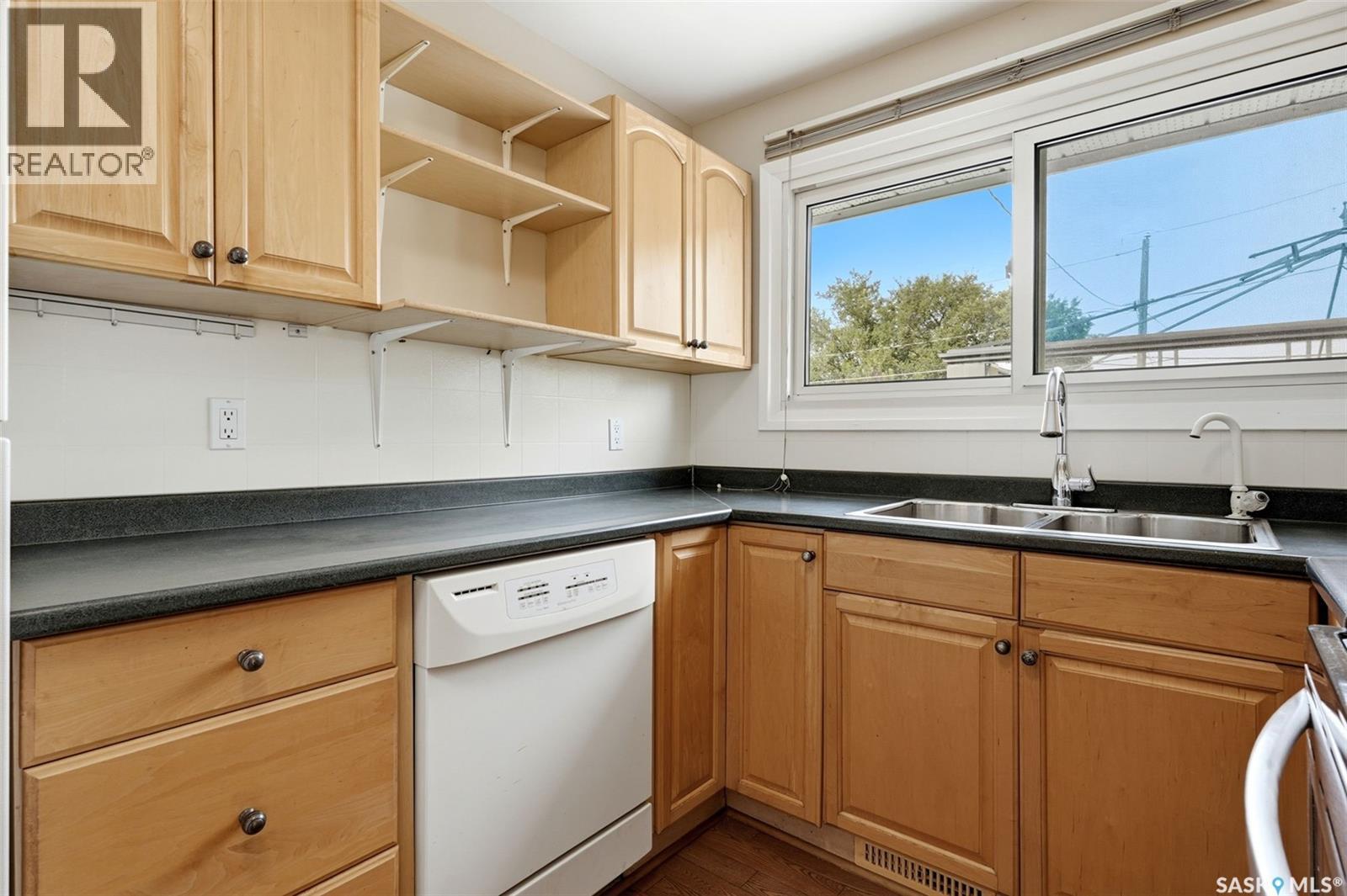 202 Mccannel Street, Regina, SK - Indoor Photo Showing Kitchen With Double Sink