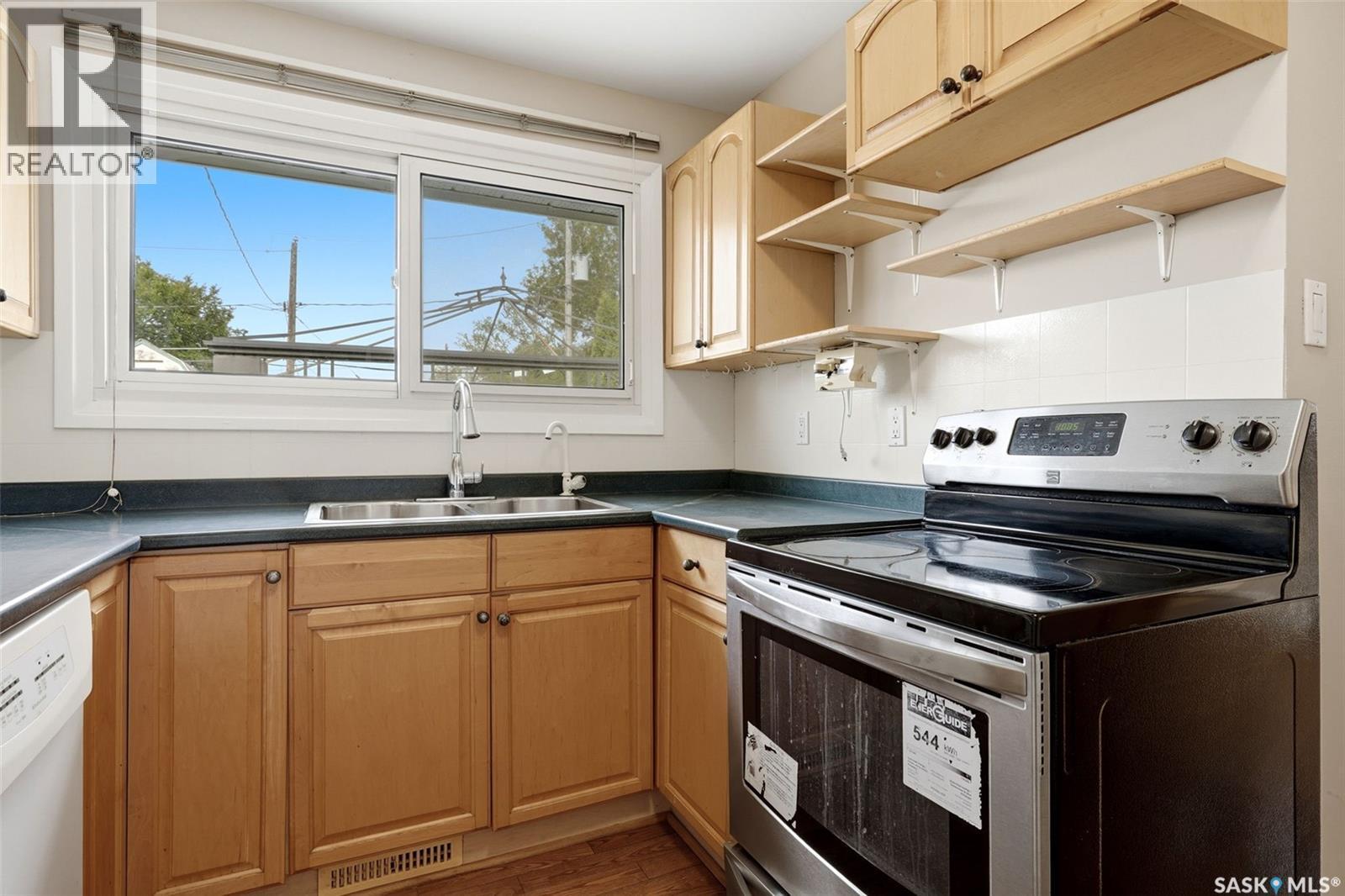 202 Mccannel Street, Regina, SK - Indoor Photo Showing Kitchen With Double Sink