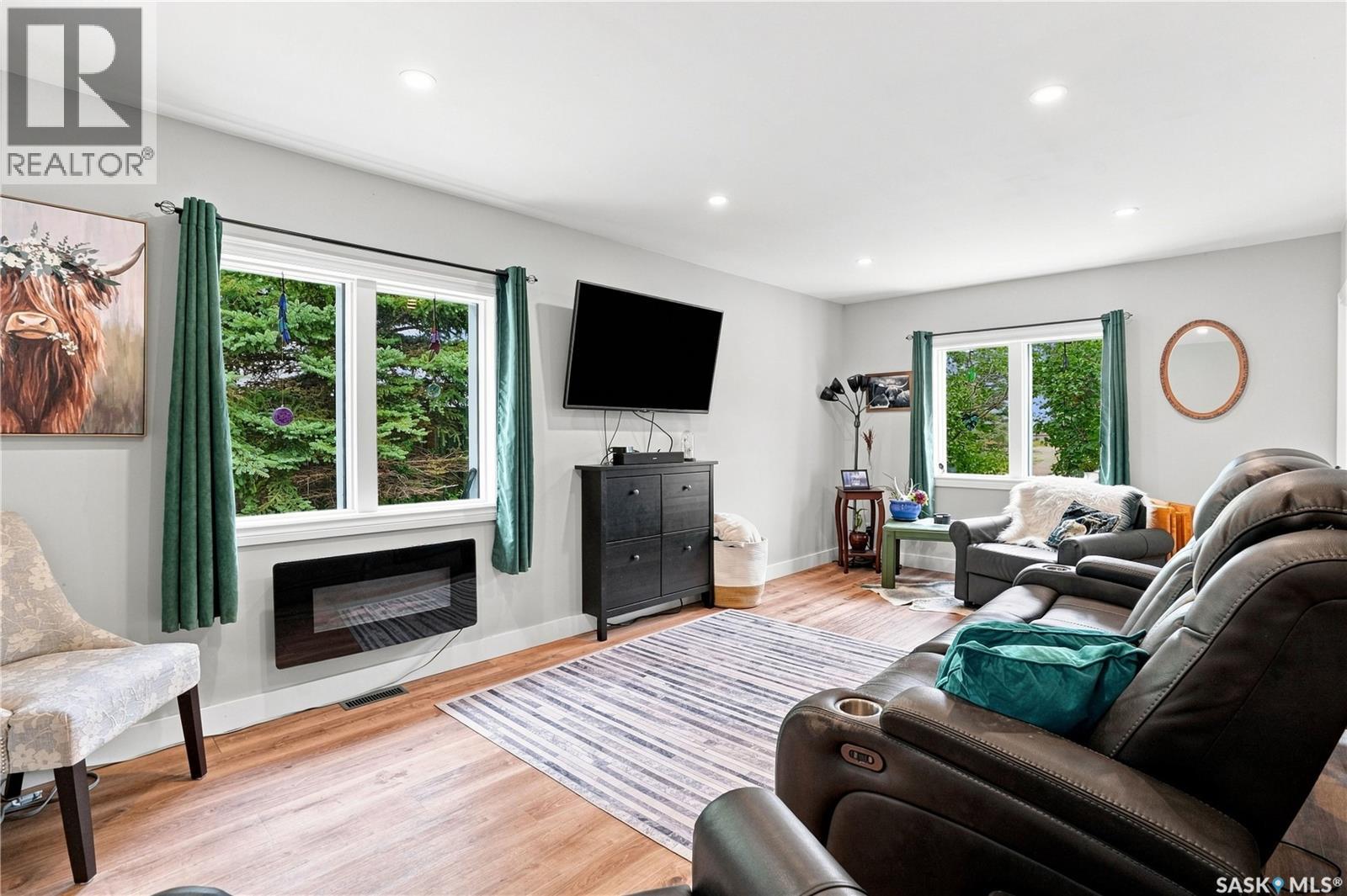 507 Railway Avenue, Bulyea, SK - Indoor Photo Showing Living Room With Fireplace