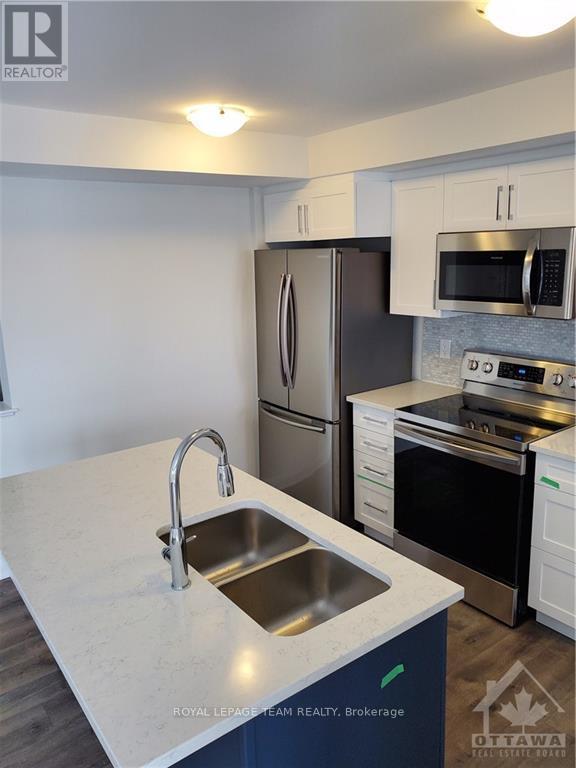 Imported from oreb - A - 225 Eldorado Private, Ottawa, ON - Indoor Photo Showing Kitchen With Stainless Steel Kitchen With Double Sink