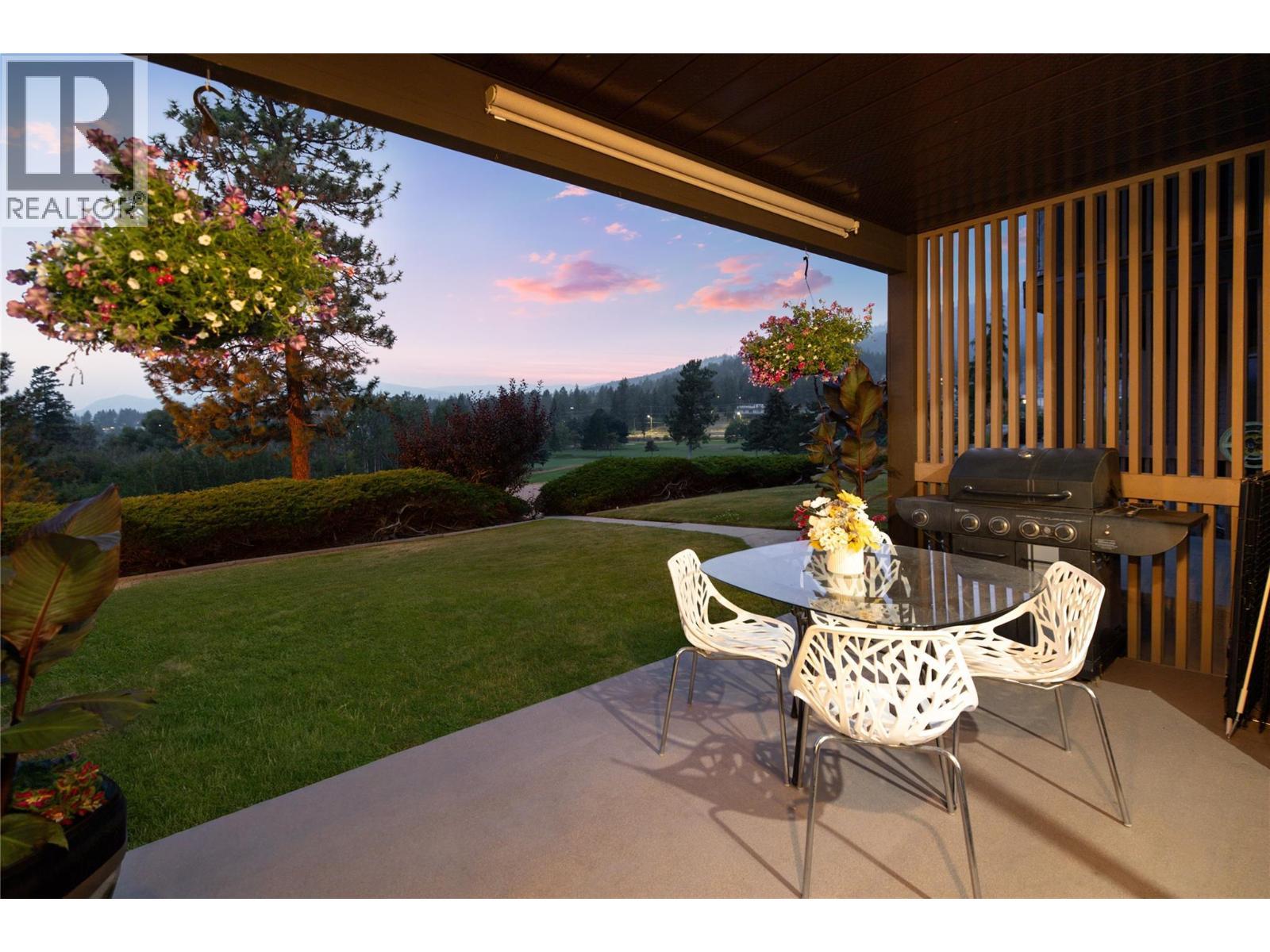 Twilight Patio View - 2226 Golf Course Drive, West Kelowna, BC - Outdoor With Deck Patio Veranda