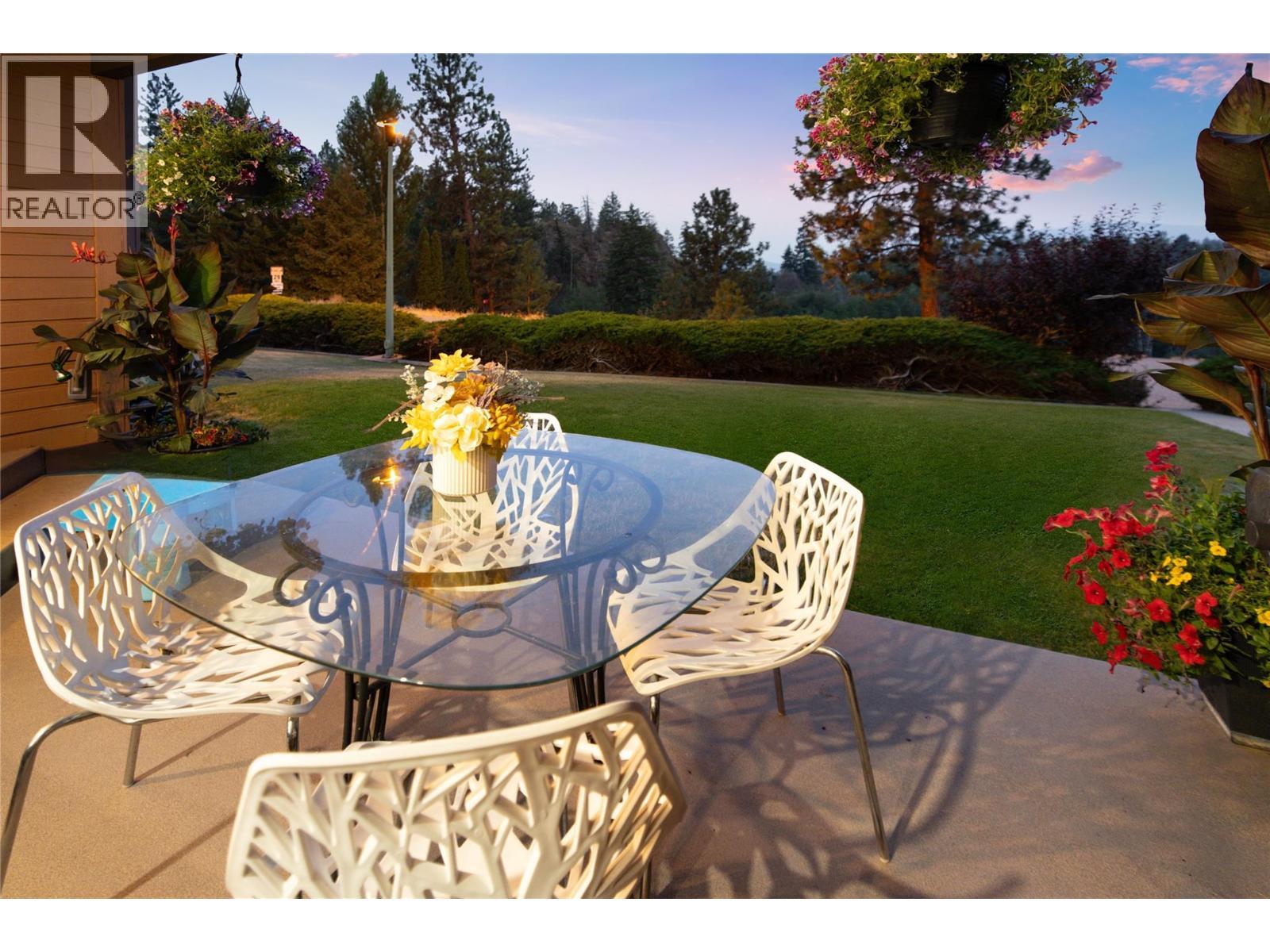 Twilight Patio View - 2226 Golf Course Drive, West Kelowna, BC - Outdoor With Deck Patio Veranda