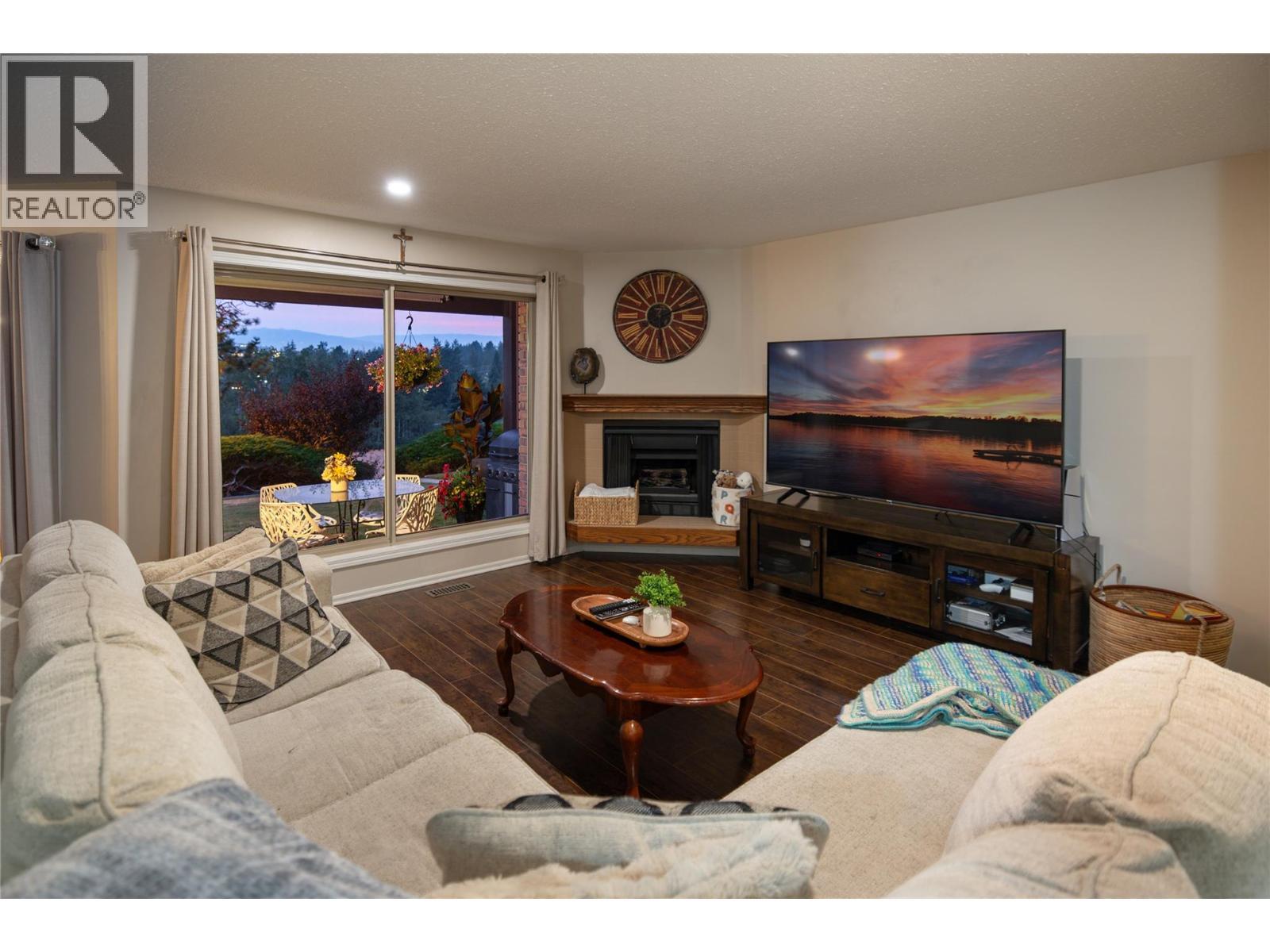 Living Room - 2226 Golf Course Drive, West Kelowna, BC - Indoor Photo Showing Living Room With Fireplace
