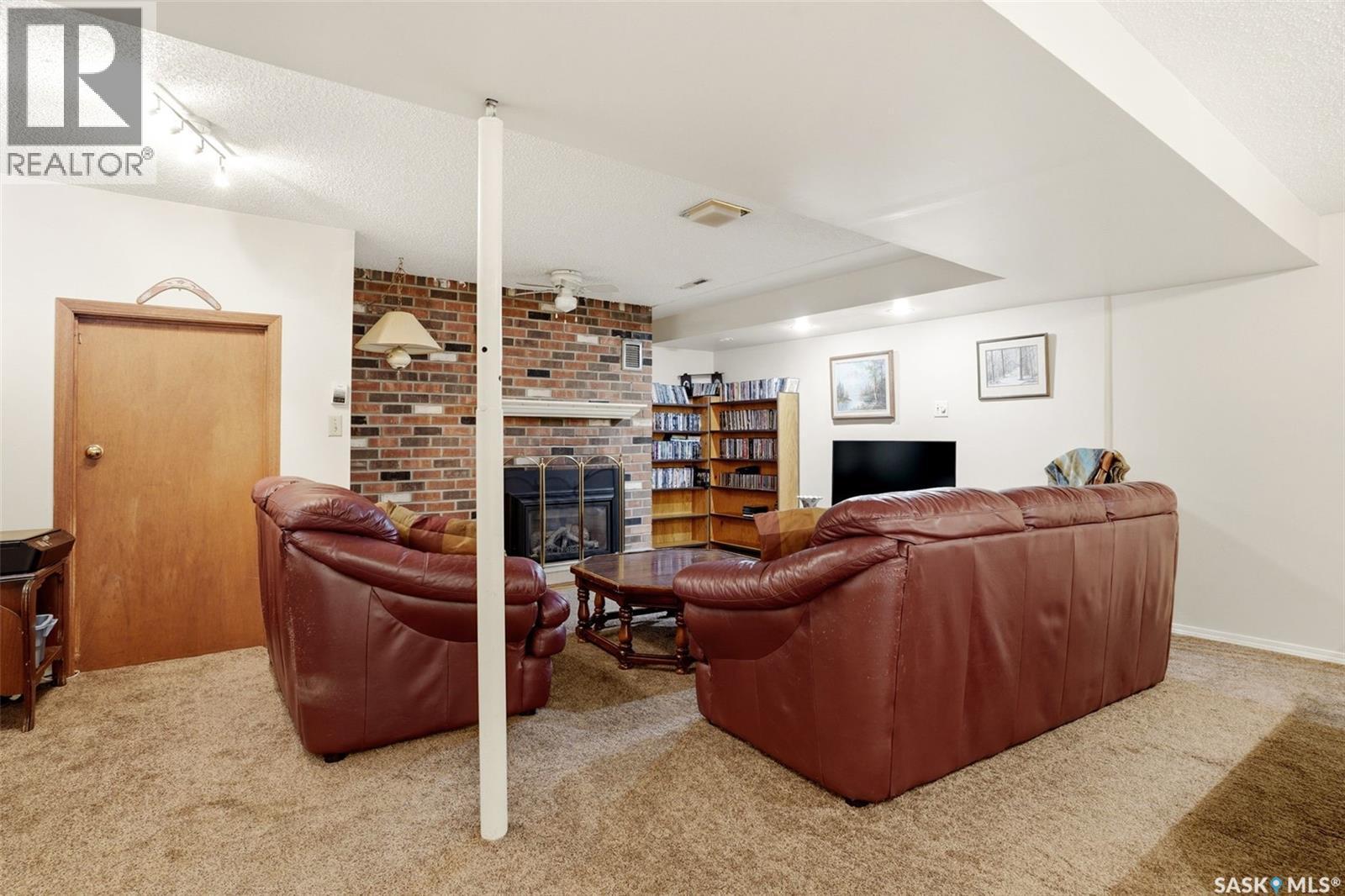 60 Krivel Crescent, Regina, SK - Indoor With Fireplace