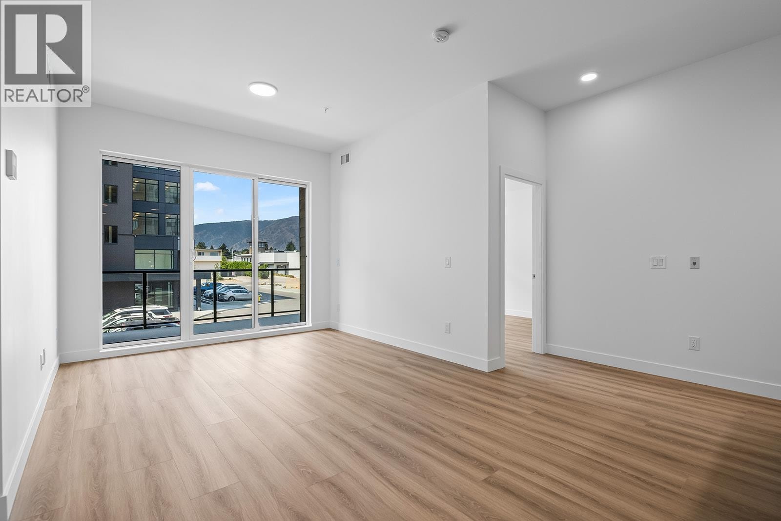 Living Room and Dining Room - 2780 Olalla Road Unit# 201, West Kelowna, BC - Indoor