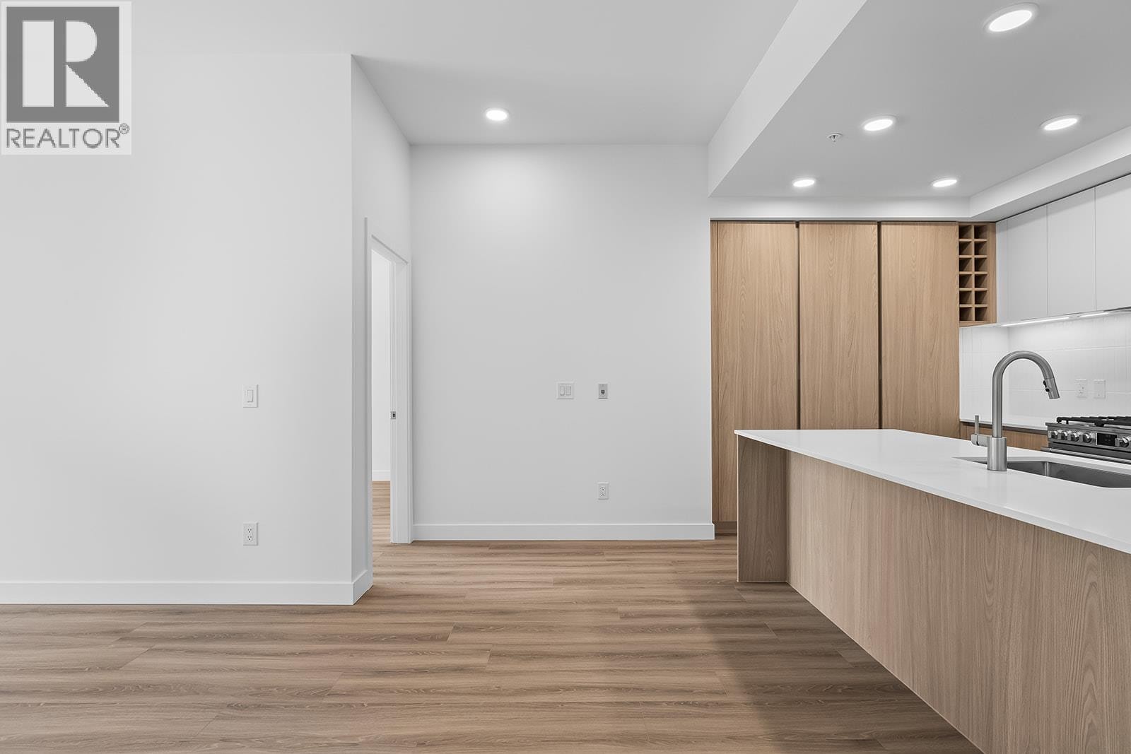 Kitchen and entry to primary suite - 2780 Olalla Road Unit# 201, West Kelowna, BC - Indoor