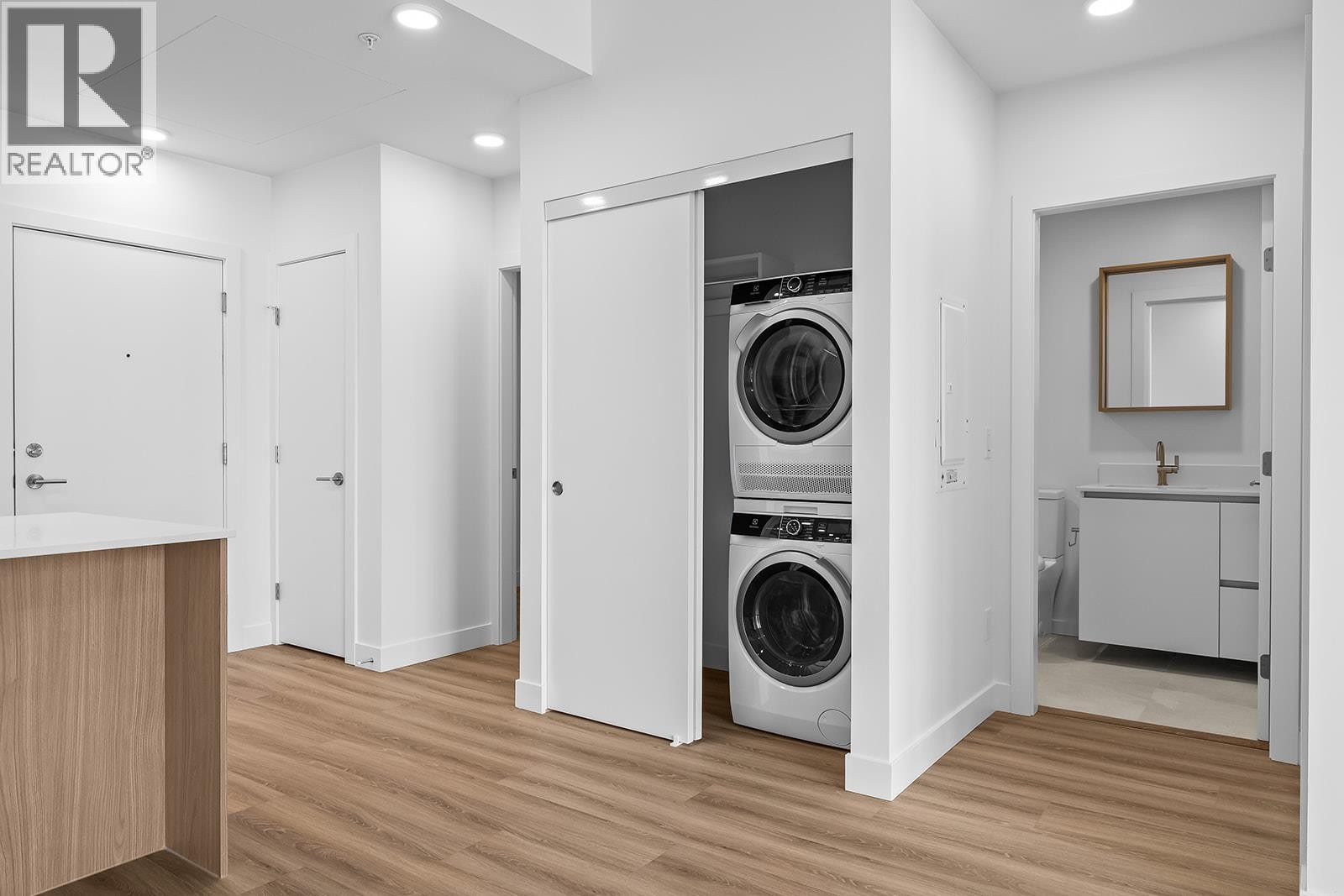 Laundry and Foyer - 2780 Olalla Road Unit# 201, West Kelowna, BC - Indoor Photo Showing Laundry Room