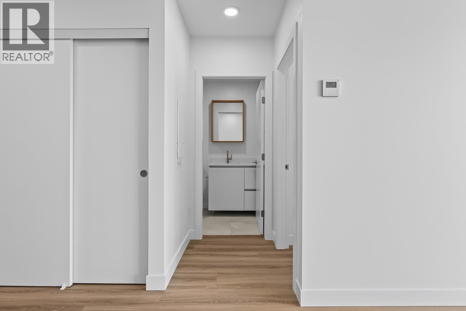 Entry to 2nd bedroom and bathroom - 2780 Olalla Road Unit# 201, West Kelowna, BC - Indoor Photo Showing Other Room