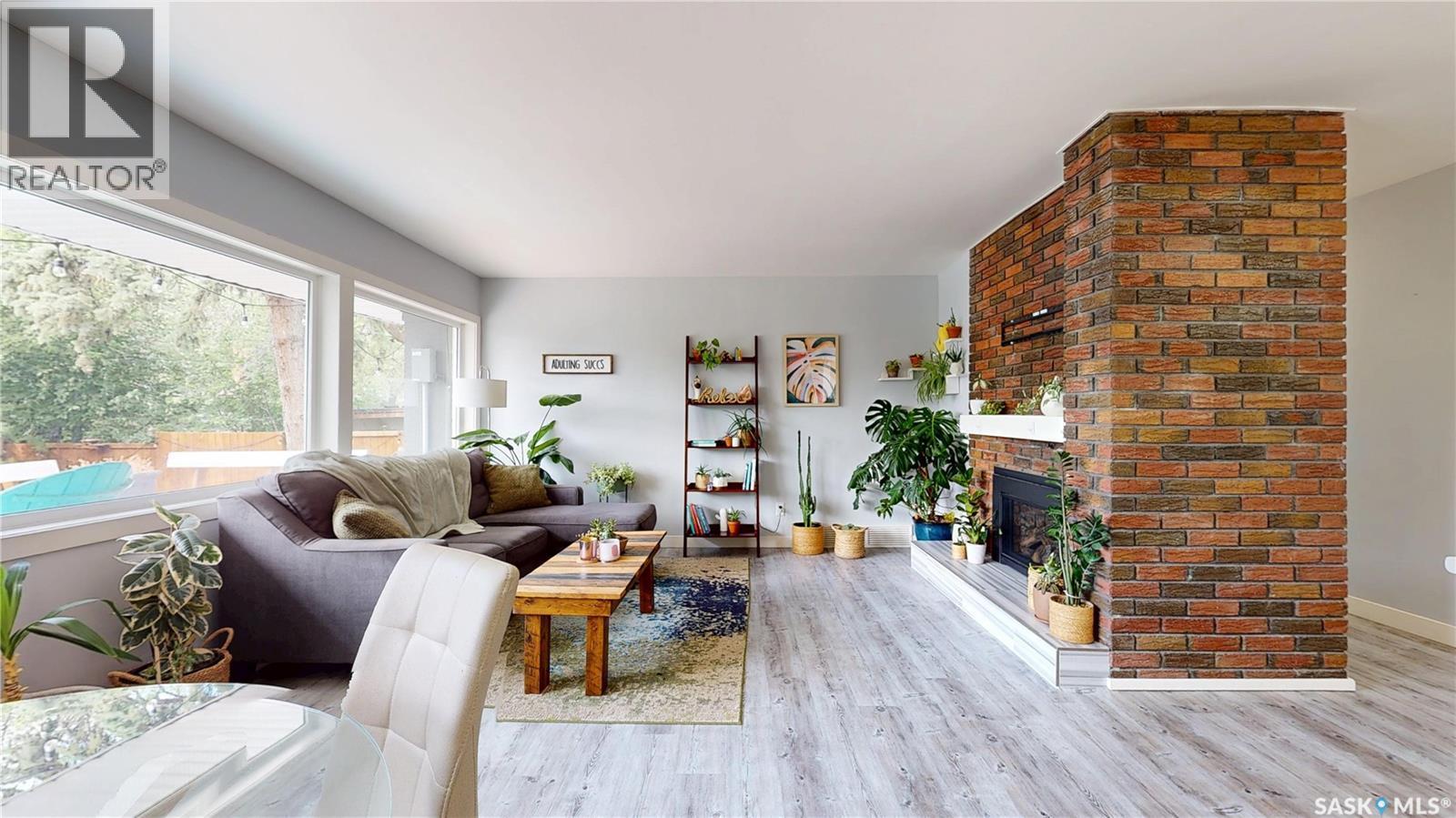 3231 Hill Avenue, Regina, SK - Indoor Photo Showing Living Room With Fireplace