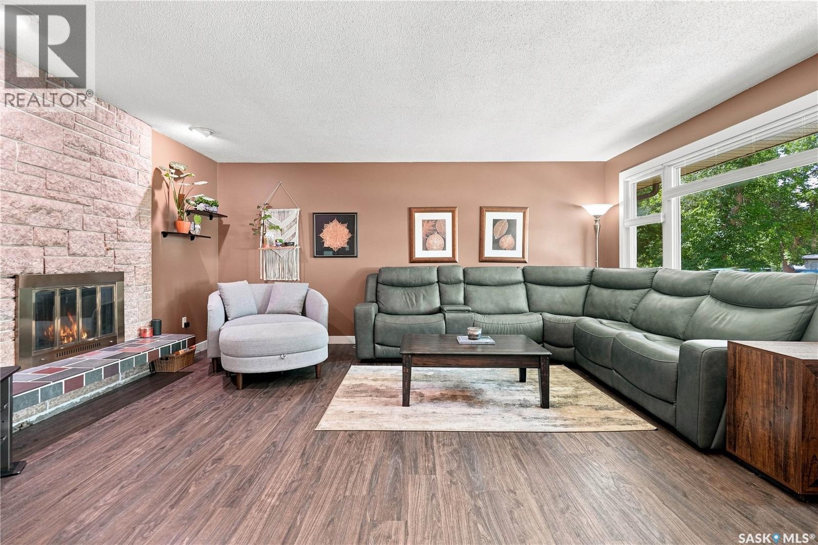 29 Everett Crescent, Regina, SK - Indoor Photo Showing Living Room With Fireplace