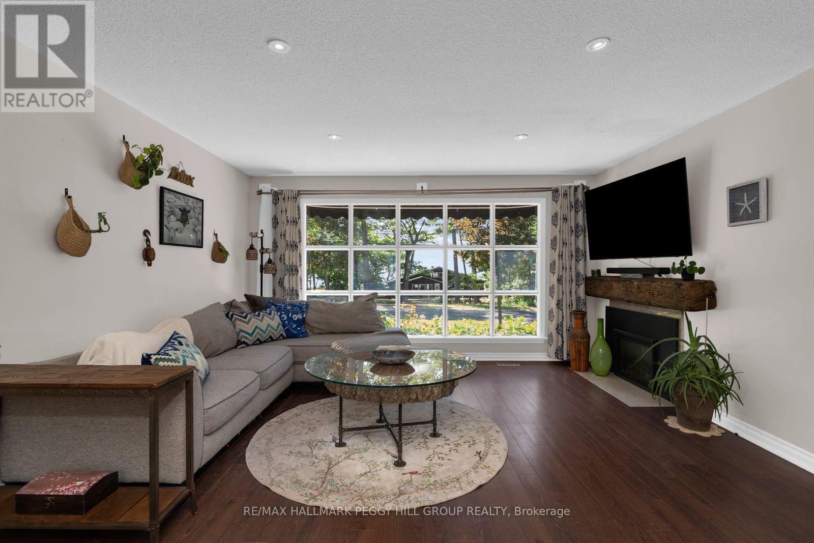 1863 Tiny Beaches Road S, Tiny, ON - Indoor Photo Showing Living Room With Fireplace