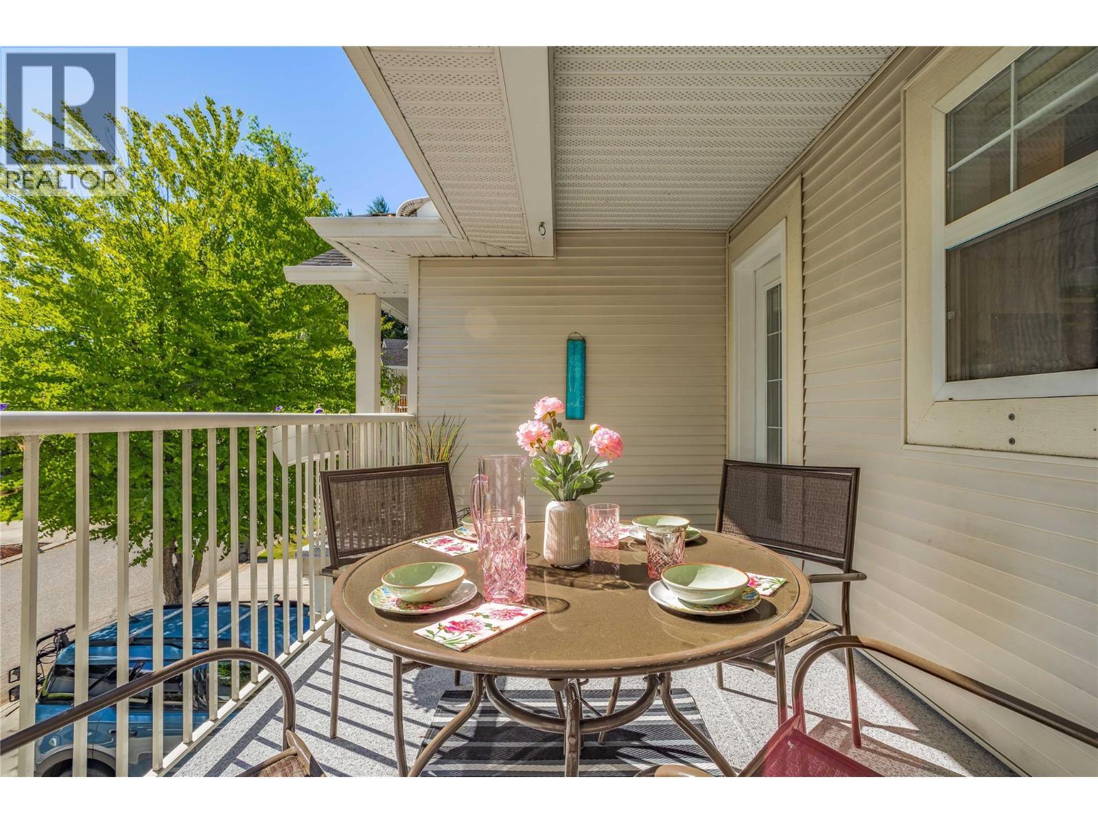 Private sundeck off of kitchen - 3825 Glen Canyon Drive Unit# 104, West Kelowna, BC - Outdoor With Deck Patio Veranda With Exterior