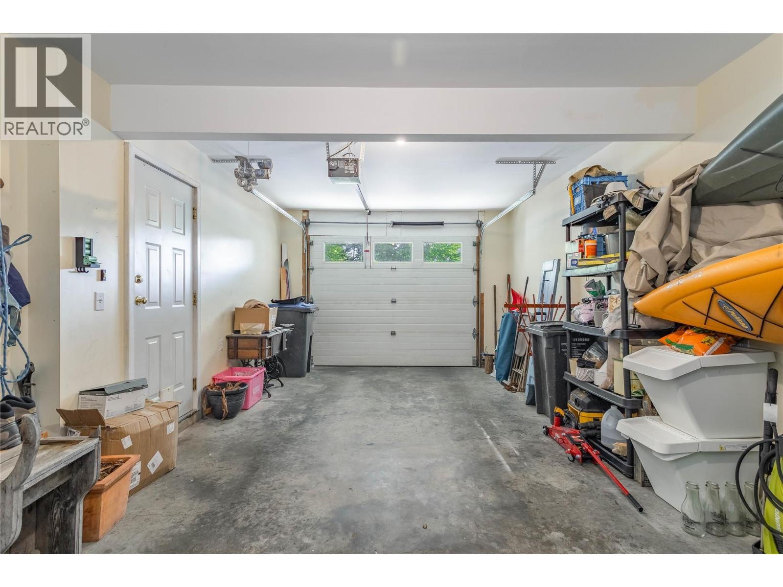 3825 Glen Canyon Drive Unit# 104, West Kelowna, BC - Indoor Photo Showing Garage