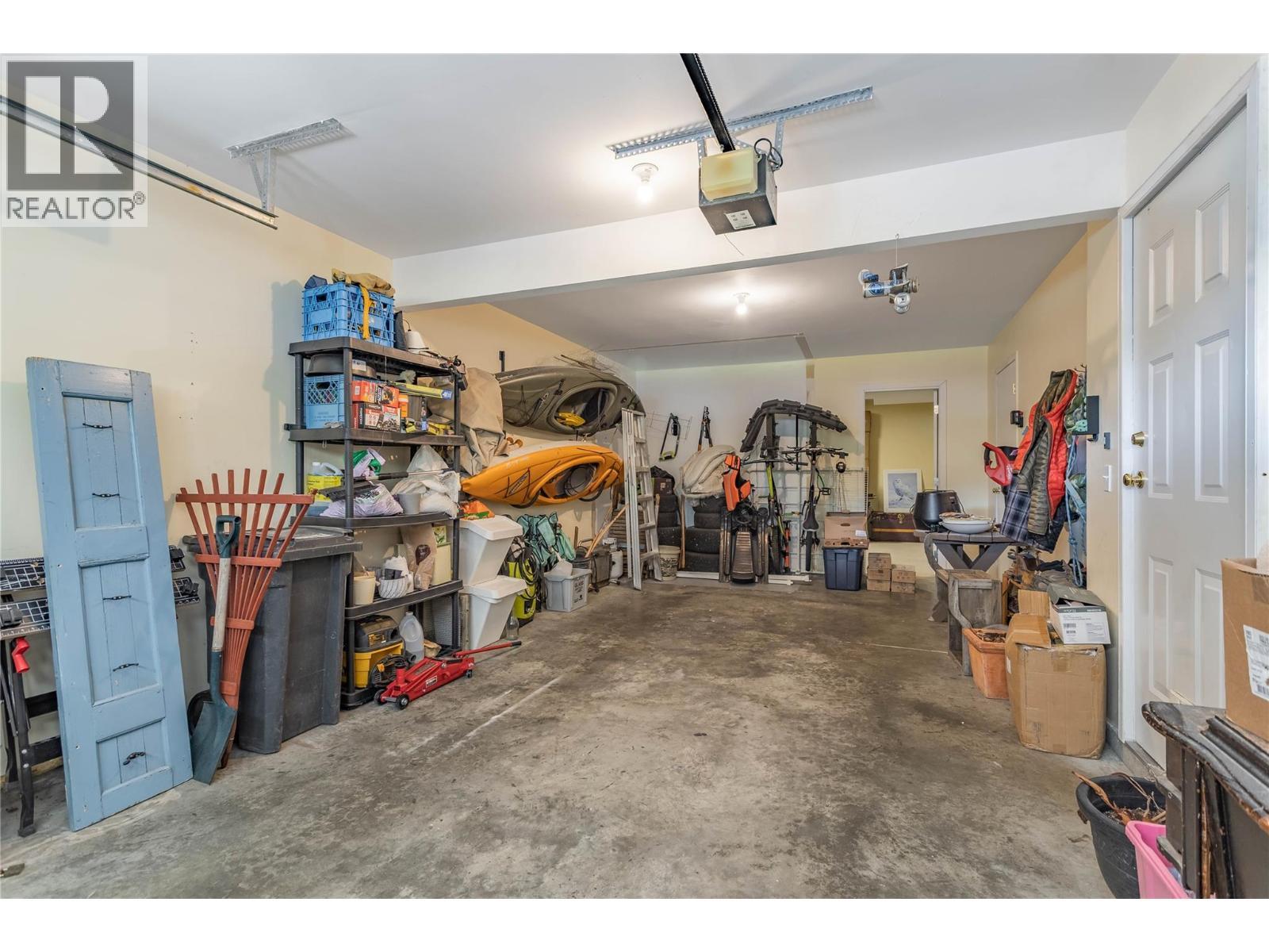 3825 Glen Canyon Drive Unit# 104, West Kelowna, BC - Indoor Photo Showing Garage