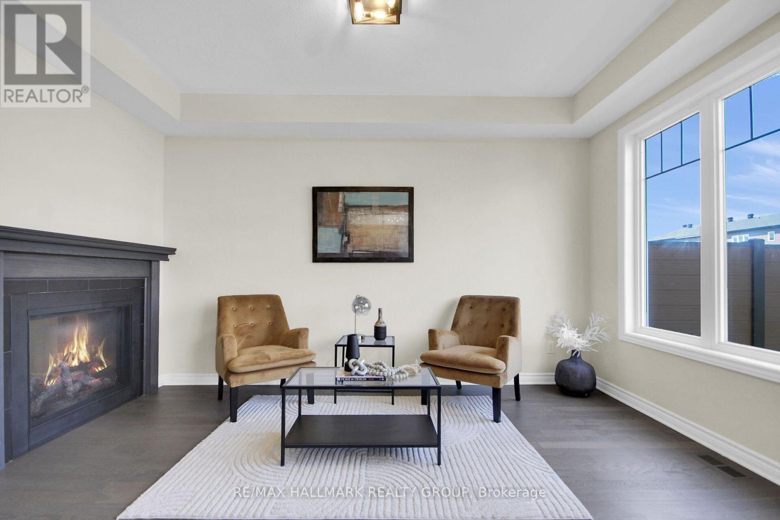 207 Willow Aster Circle, Ottawa, ON - Indoor Photo Showing Living Room With Fireplace