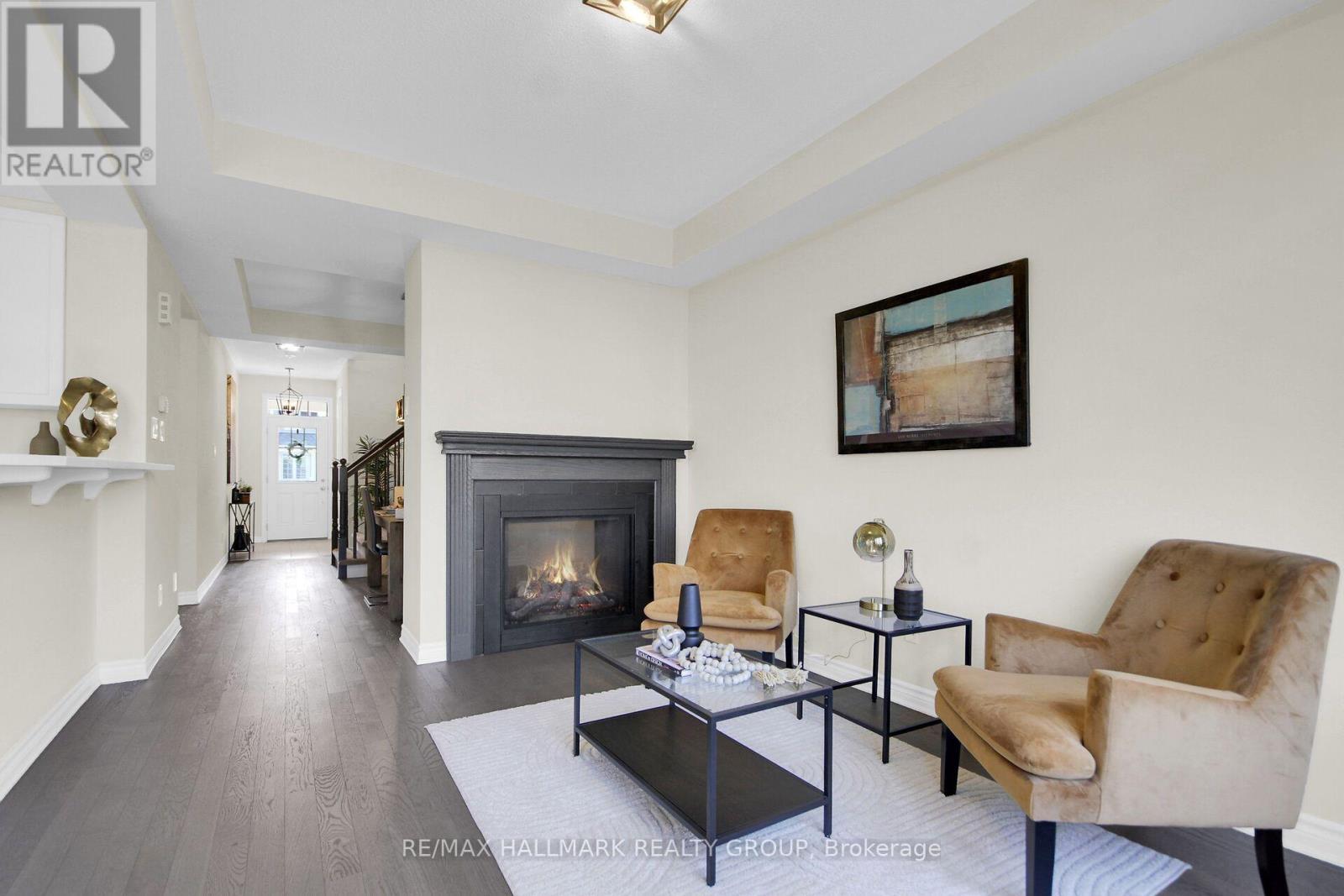 207 Willow Aster Circle, Ottawa, ON - Indoor Photo Showing Living Room With Fireplace