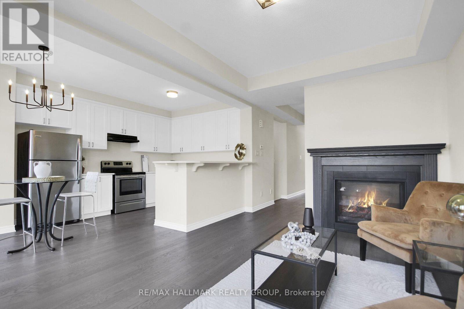 207 Willow Aster Circle, Ottawa, ON - Indoor Photo Showing Living Room With Fireplace